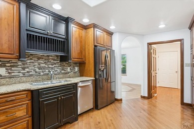 Wake up to wide-open fairway views and the relaxed rhythm of on Desert Hawk At Pueblo West in Colorado - for sale on GolfHomes.com, golf home, golf lot