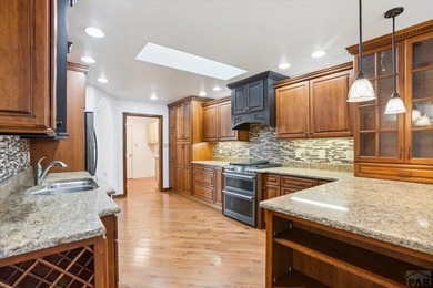 Wake up to wide-open fairway views and the relaxed rhythm of on Desert Hawk At Pueblo West in Colorado - for sale on GolfHomes.com, golf home, golf lot