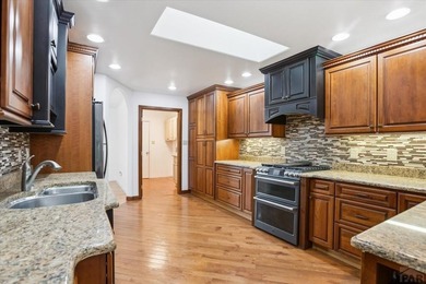 Wake up to wide-open fairway views and the relaxed rhythm of on Desert Hawk At Pueblo West in Colorado - for sale on GolfHomes.com, golf home, golf lot