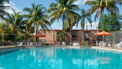 Move-in ready first-floor condo in sought-after Miami Lakes on Don Shulas Golf Course and Club in Florida - for sale on GolfHomes.com, golf home, golf lot