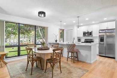 Come see this gorgeous CORNER END UNIT Golf Villa overlooking on PGA National Golf Club in Florida - for sale on GolfHomes.com, golf home, golf lot