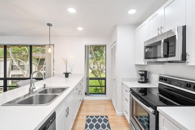 Come see this gorgeous CORNER END UNIT Golf Villa overlooking on PGA National Golf Club in Florida - for sale on GolfHomes.com, golf home, golf lot