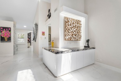 This stylishly renovated penthouse condo blends modern finishes on Polo Club of Boca Raton in Florida - for sale on GolfHomes.com, golf home, golf lot