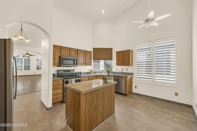 Impeccably maintained Riviera villa with Catalina Mountain views on Saddlebrooke Golf Course in Arizona - for sale on GolfHomes.com, golf home, golf lot