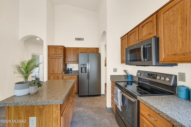 Impeccably maintained Riviera villa with Catalina Mountain views on Saddlebrooke Golf Course in Arizona - for sale on GolfHomes.com, golf home, golf lot