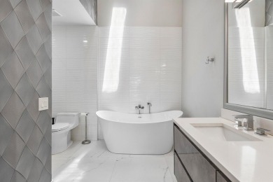 This stylishly renovated penthouse condo blends modern finishes on Polo Club of Boca Raton in Florida - for sale on GolfHomes.com, golf home, golf lot
