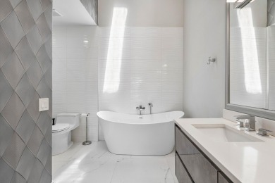 This stylishly renovated penthouse condo blends modern finishes on Polo Club of Boca Raton in Florida - for sale on GolfHomes.com, golf home, golf lot