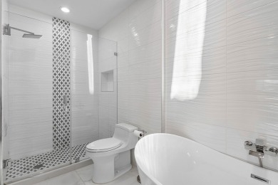 This stylishly renovated penthouse condo blends modern finishes on Polo Club of Boca Raton in Florida - for sale on GolfHomes.com, golf home, golf lot