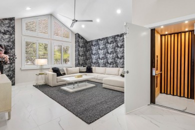 This stylishly renovated penthouse condo blends modern finishes on Polo Club of Boca Raton in Florida - for sale on GolfHomes.com, golf home, golf lot