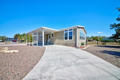 Welcome to your dream abode, nestled on a desirable corner lot on Brookridge Country Club in Florida - for sale on GolfHomes.com, golf home, golf lot