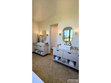 Positioned on the 18th green of the prestigious Teton Springs on Teton Springs Resort and Club in Idaho - for sale on GolfHomes.com, golf home, golf lot