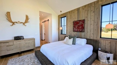 Positioned on the 18th green of the prestigious Teton Springs on Teton Springs Resort and Club in Idaho - for sale on GolfHomes.com, golf home, golf lot