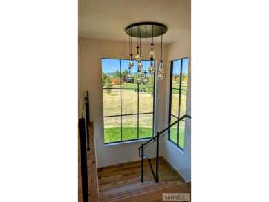 Positioned on the 18th green of the prestigious Teton Springs on Teton Springs Resort and Club in Idaho - for sale on GolfHomes.com, golf home, golf lot