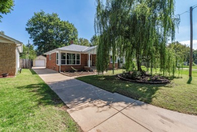 Welcome home to this move-in ready, 2 bedroom, 1 bath home on MacDonald Golf Course in Kansas - for sale on GolfHomes.com, golf home, golf lot