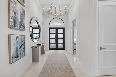 Experience refined living in this extraordinary Golf Membership on Addison Reserve in Florida - for sale on GolfHomes.com, golf home, golf lot