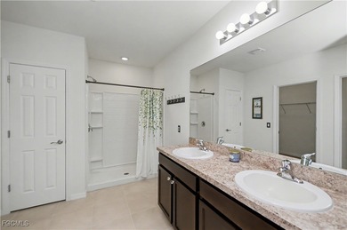 This charming 2019 well cared for 3/2 Eastham floorplan with on Sabal Springs Golf and Racquet Club in Florida - for sale on GolfHomes.com, golf home, golf lot