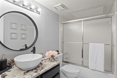 TASTEFULLY REMODELED AND UPDATED first floor condo with double on Pecan Plantation Country Club in Texas - for sale on GolfHomes.com, golf home, golf lot
