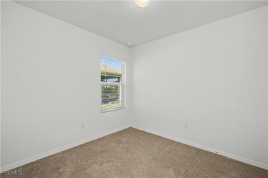 This charming 2019 well cared for 3/2 Eastham floorplan with on Sabal Springs Golf and Racquet Club in Florida - for sale on GolfHomes.com, golf home, golf lot