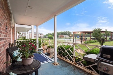 TASTEFULLY REMODELED AND UPDATED first floor condo with double on Pecan Plantation Country Club in Texas - for sale on GolfHomes.com, golf home, golf lot