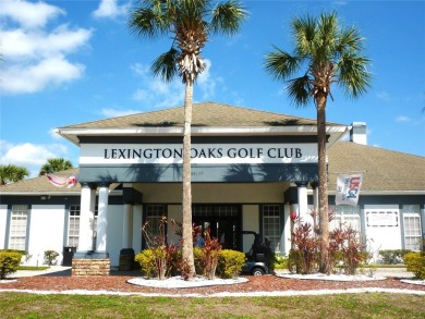 Under contract-accepting backup offers. Charming, Convenient on Lexington Oaks Golf Club in Florida - for sale on GolfHomes.com, golf home, golf lot