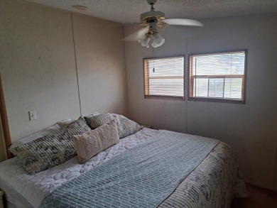 ONE BEDROOM , ONE BATH WITH FULL ADDITION ALL SEASON ROOM. THIS on Silver Dollar Golf and Trap Club in Florida - for sale on GolfHomes.com, golf home, golf lot