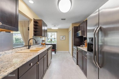 Tranquil Living in a Prestigious Ormond Beach Golf Course on Plantation Bay Golf and Country Club in Florida - for sale on GolfHomes.com, golf home, golf lot