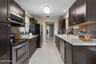 Tranquil Living in a Prestigious Ormond Beach Golf Course on Plantation Bay Golf and Country Club in Florida - for sale on GolfHomes.com, golf home, golf lot