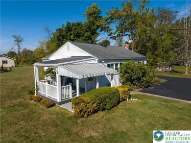 Down a shared driveway, far away from the main road you will on Wyoming Valley Country Club in Pennsylvania - for sale on GolfHomes.com, golf home, golf lot