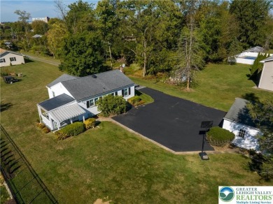 Down a shared driveway, far away from the main road you will on Wyoming Valley Country Club in Pennsylvania - for sale on GolfHomes.com, golf home, golf lot