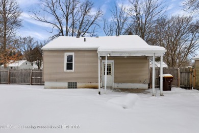 Nestled in the charming City of Williamston, this beautiful home on Brookshire Inn and Golf Club in Michigan - for sale on GolfHomes.com, golf home, golf lot