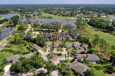 Tranquil Living in a Prestigious Ormond Beach Golf Course on Plantation Bay Golf and Country Club in Florida - for sale on GolfHomes.com, golf home, golf lot