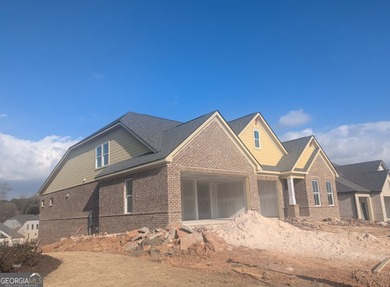 The Berkshire Plan Built by Windsor Bluffs Builder Group. Quick on Windermere Golf Club in Georgia - for sale on GolfHomes.com, golf home, golf lot