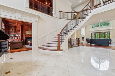 An entertainers dream! Welcome to this European-inspired estate on Chateau Elan Golf Club  in Georgia - for sale on GolfHomes.com, golf home, golf lot