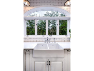 Welcome to an extraordinary residenc...a masterfully renovated on Quail Creek Country Club in Florida - for sale on GolfHomes.com, golf home, golf lot