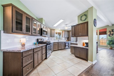 Wide-open space, mountain views, and room to breathe welcome to on Los Lagos Golf Club in Arizona - for sale on GolfHomes.com, golf home, golf lot