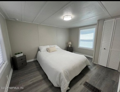 Living in Starke, Florida offers a blend of small-town charm on Starke Golf and Country Club in Florida - for sale on GolfHomes.com, golf home, golf lot