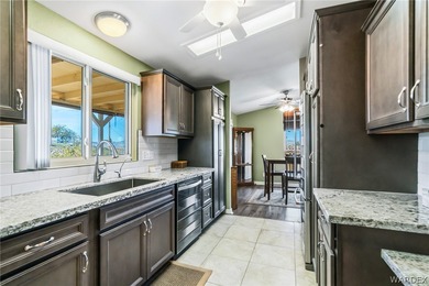 Wide-open space, mountain views, and room to breathe welcome to on Los Lagos Golf Club in Arizona - for sale on GolfHomes.com, golf home, golf lot