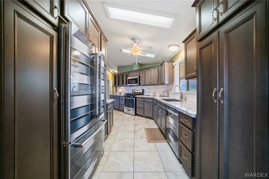 Wide-open space, mountain views, and room to breathe welcome to on Los Lagos Golf Club in Arizona - for sale on GolfHomes.com, golf home, golf lot