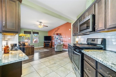 Wide-open space, mountain views, and room to breathe welcome to on Los Lagos Golf Club in Arizona - for sale on GolfHomes.com, golf home, golf lot