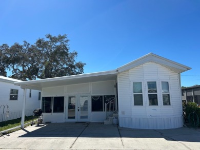 This a one bedroom and one bath with very a large addition on Silver Dollar Golf and Trap Club in Florida - for sale on GolfHomes.com, golf home, golf lot