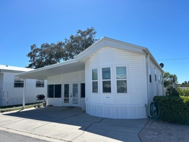 This a one bedroom and one bath with very a large addition on Silver Dollar Golf and Trap Club in Florida - for sale on GolfHomes.com, golf home, golf lot