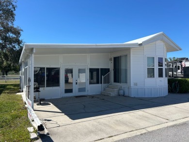 This a one bedroom and one bath with very a large addition on Silver Dollar Golf and Trap Club in Florida - for sale on GolfHomes.com, golf home, golf lot