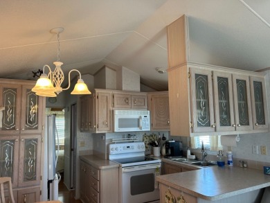 This a one bedroom and one bath with very a large addition on Silver Dollar Golf and Trap Club in Florida - for sale on GolfHomes.com, golf home, golf lot
