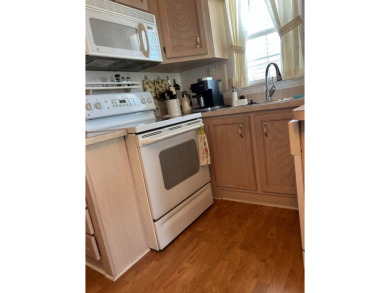 This a one bedroom and one bath with very a large addition on Silver Dollar Golf and Trap Club in Florida - for sale on GolfHomes.com, golf home, golf lot