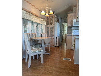 This a one bedroom and one bath with very a large addition on Silver Dollar Golf and Trap Club in Florida - for sale on GolfHomes.com, golf home, golf lot