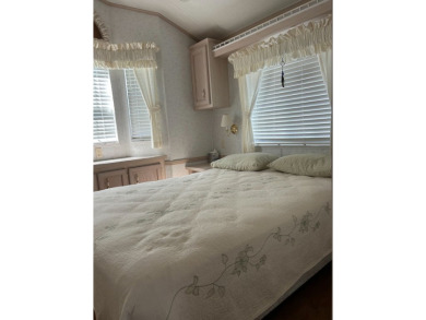 This a one bedroom and one bath with very a large addition on Silver Dollar Golf and Trap Club in Florida - for sale on GolfHomes.com, golf home, golf lot