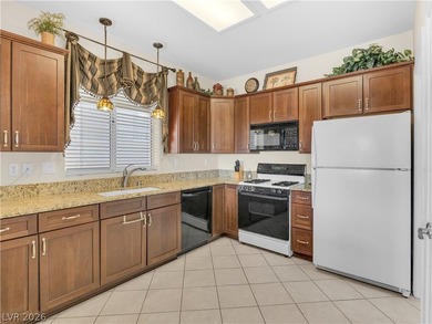Welcome to this beautifully maintained Warwick model townhome in on Eagle Crest Golf Club in Nevada - for sale on GolfHomes.com, golf home, golf lot