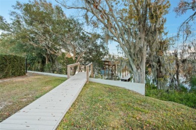 DEEDED, COVERED BOAT SLIP TO THE BUTLER CHAIN OF LAKES!! on Arnold Palmers Bay Hill Club and Lodge  in Florida - for sale on GolfHomes.com, golf home, golf lot