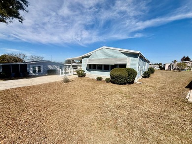 Home is located in Water Oak Country Club Estates, an active 55 on Water Oak Country Club Estates in Florida - for sale on GolfHomes.com, golf home, golf lot