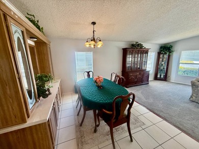 Home is located in Water Oak Country Club Estates, an active 55 on Water Oak Country Club Estates in Florida - for sale on GolfHomes.com, golf home, golf lot